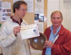 The monthly winner Howard Overton received his certificate from Tobias Kaye